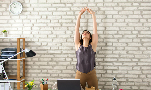 Businesswoman Stretching