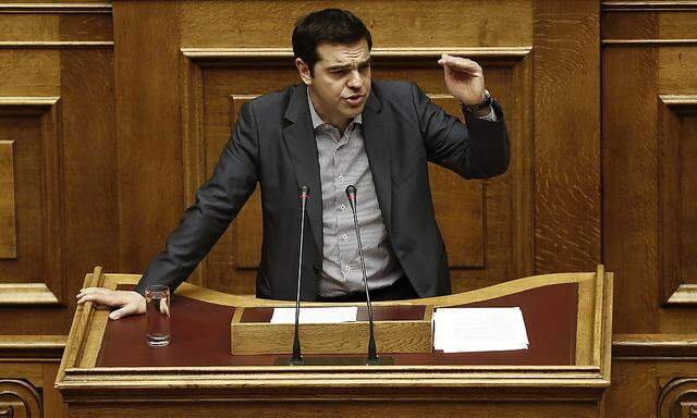 Greece's Prime Minister Alexis Tsipras Attends Parliament After Bowing To Creditors' Demands