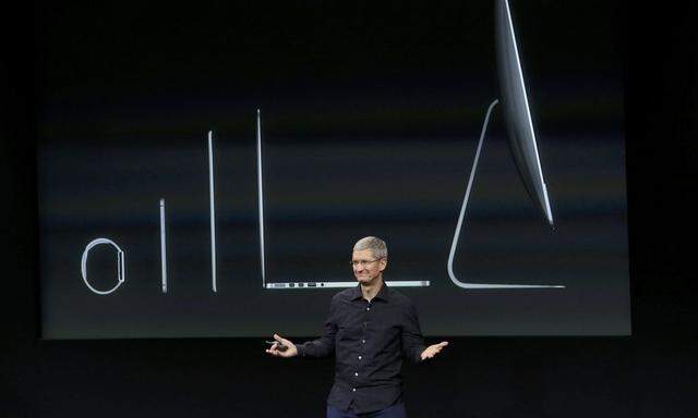 Apple CEO Tim Cook speaks during a presentation at Apple headquarters in Cupertino