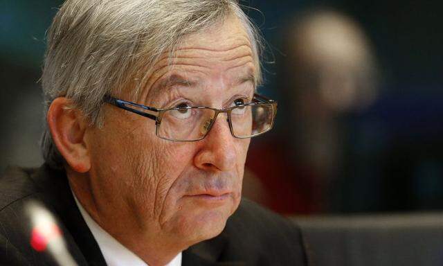File photo of Luxembourg's then-Prime Minister Juncker testifies before the European Parliament's Committee on Economic and Monetary Affairs in Brussels