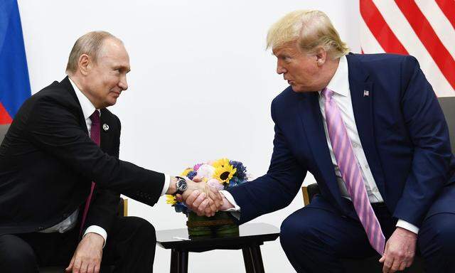 Putin und Trump beim letzten Treffen