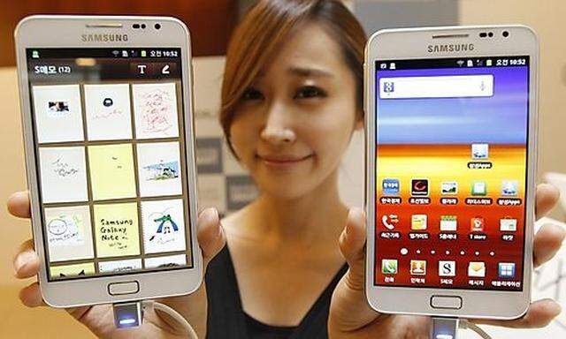 File photo of a model posing with Galaxy Note of Samsung Electronics during a local launch event for 