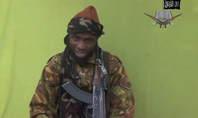 Boko Haram leader Abubakar Shekau speaks at an unknown location in this still image taken from an undated video released by Boko Haram