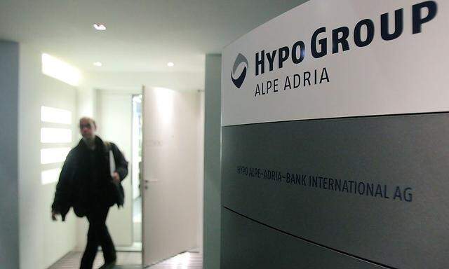 A man leaves the office of nationalised Austrian lender Hypo Alpe Adria in Vienna