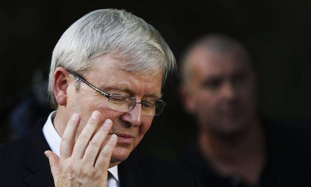 Australian PM Rudd reacts as he talks to the media during his election campaign in Sydney