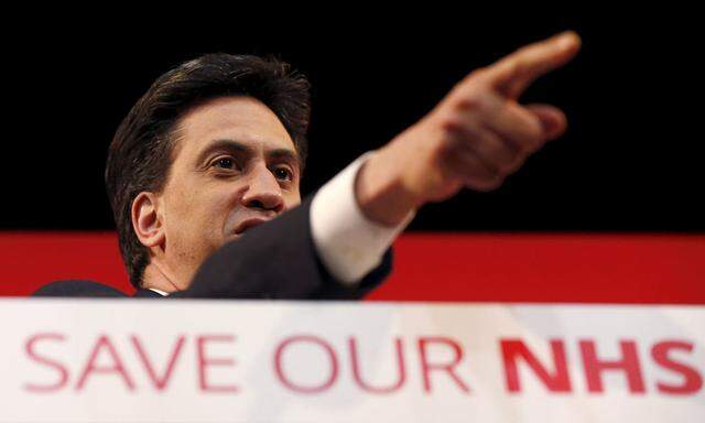 Britain's opposition Labour Party leader Ed Miliband gestures during a speech on health at a campaign event in Leeds, northern England