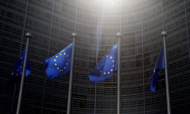 European Union flags flutter outside the EU Commission headquarters in Brussels