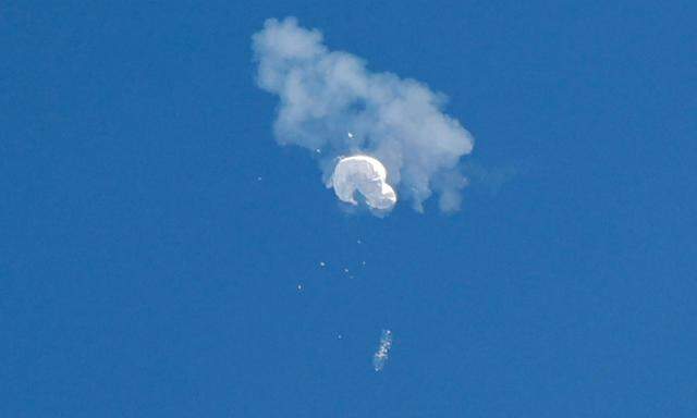 FILE PHOTO: The suspected Chinese spy balloon drifts to the ocean after being shot down off the coast in Surfside Beach