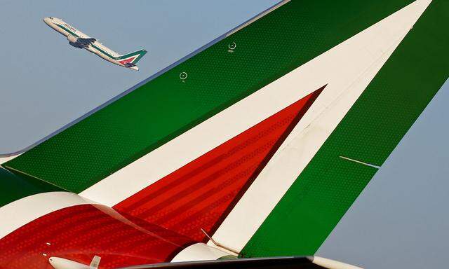 FILE PHOTO: An Alitalia Airbus A320 passenger aircraft takes off at Fiumicino International Airport in Rome