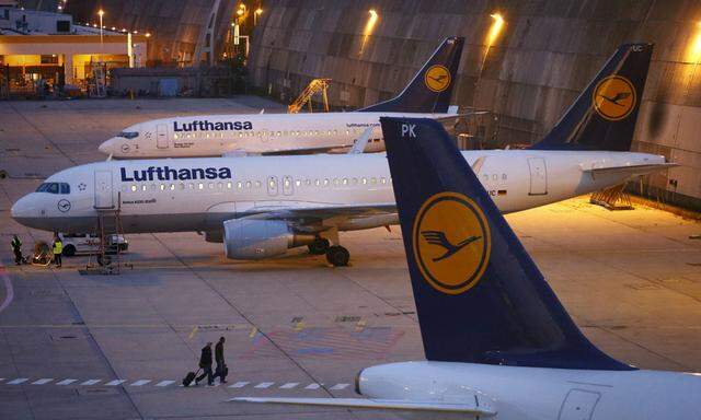 Passenger planes of German air carrier Lufthansa are parked at the technical maintaining area at the Frankfurt Airport