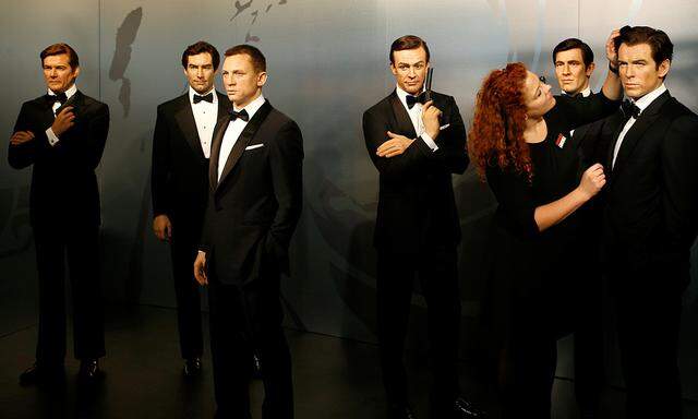 Wax figures of all 6 actors who portrayed James Bond character, Roger Moore, Timothy Dalton, Daniel Craig, Sean Connery, George Lazenby and Pierce Brosnan are seen in the Madame Tussauds wax museum in Berlin