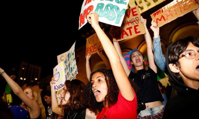 Demonstrators protest outside of City Hall following the election of Republican Donald Trump as President of the United States in downtown Los Angeles, California