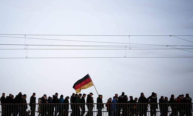 160207 DRESDEN Feb 7 2016 Supporters of the anti Islam movement PEGIDA leave after a rall