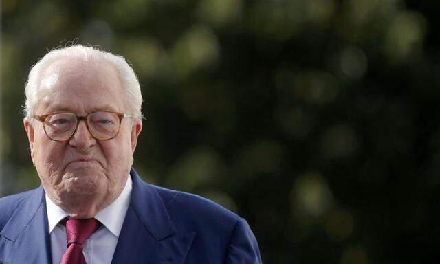 French far-right National Front founder Jean-Marie Le Pen arrives for a news briefing at the end of a hearing of the executive committee of the party at their headquarters in Nanterre