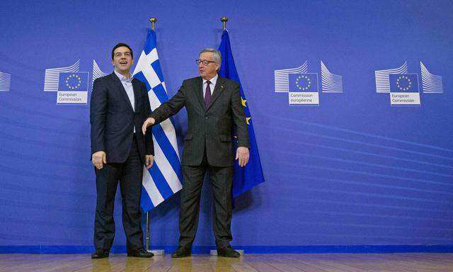 European Commission President Juncker welcomes Greek Prime Minister Tsipras ahead of a meeting at the EU Commission headquarters in Brussels