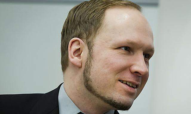 The self-styled, anti-Muslim militant Anders Behring Breivik, sits inside the court following an inci