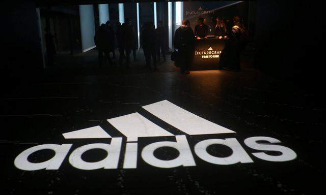 FILE PHOTO: An Adidas logo is seen at the new Futurecraft shoe unveiling event in New York City