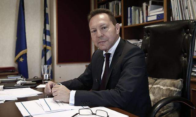 Greece's Finance Minister Stournaras poses during an interview in Athens