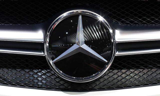 A Mercedes logo is seen on a car displayed on media day at the Paris Mondial de l'Automobile