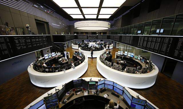 The German share prize index board and the trading room of Frankfurt´s stock exchange are photographed during afternoon trading session in Frankfurt