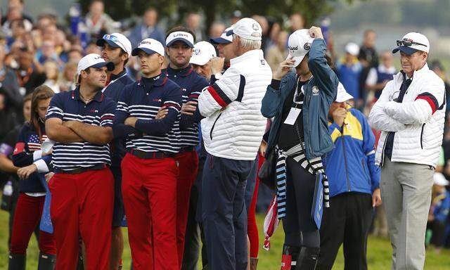 U.S. Ryder Cup captain Tom Watson and players watch play during the 40th Ryder Cup at Gleneagles