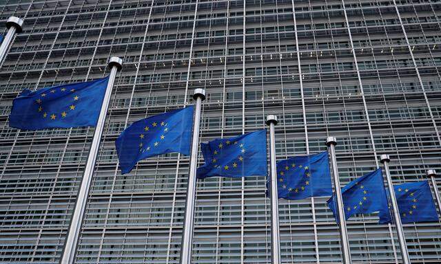 European Union flags flutter outside the EU Commission headquarters in Brussels