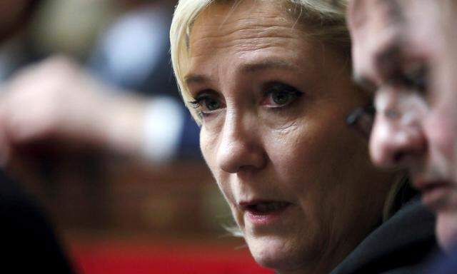 FILE PHOTO: Member of parliament Marine Le Pen of France´s far-right National Front (FN) political party attends the questions to the government session at the National Assembly in Paris