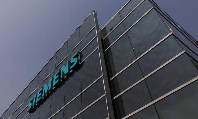 FILE PHOTO: A logo of Siemens is pictured on a building in Mexico City