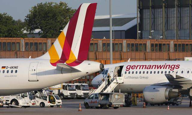 Lufthansa's German low-cost carrier Germanwings aircrafts are pictured on the tarmac at Berlin Tegel airport