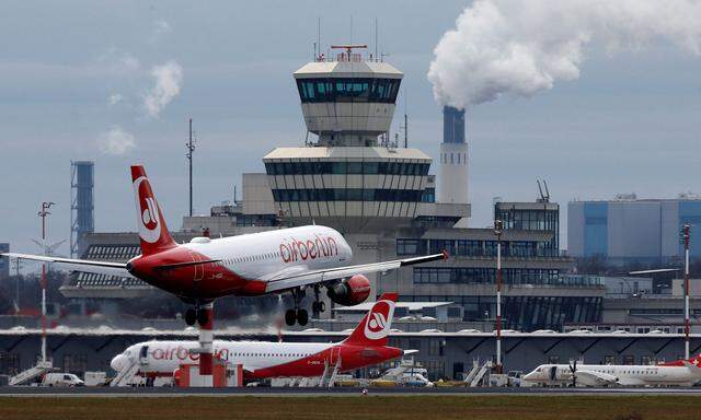 FILE PHOTO: A German carrier AirBerlin aircraft is pictured during landing at Tegel airport in Berlin