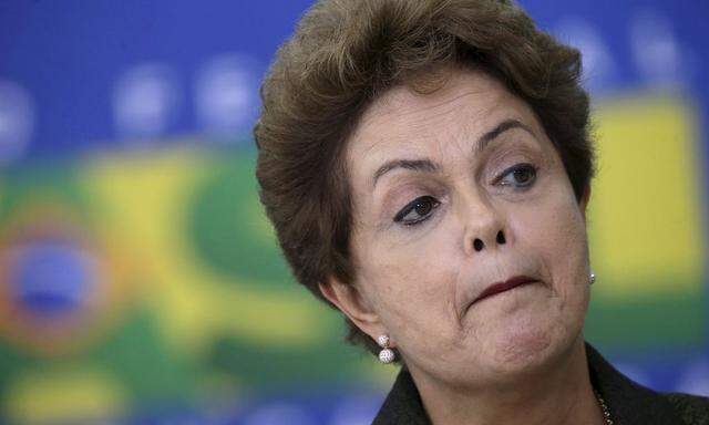 Brazil's President Rousseff reacts during the inauguration of the new Minister of Tourism Eduardo Alves at the Planalto Palace in Brasilia 