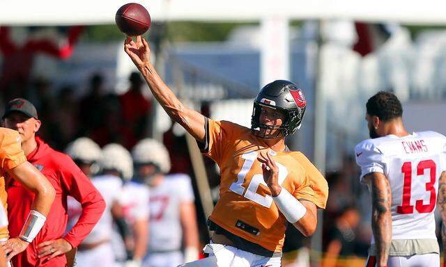 TAMPA, FL - AUG 01: Tampa Bay Buccaneers quarterback Tom Brady (12) throws a pass during the Tampa Bay Buccaneers Train