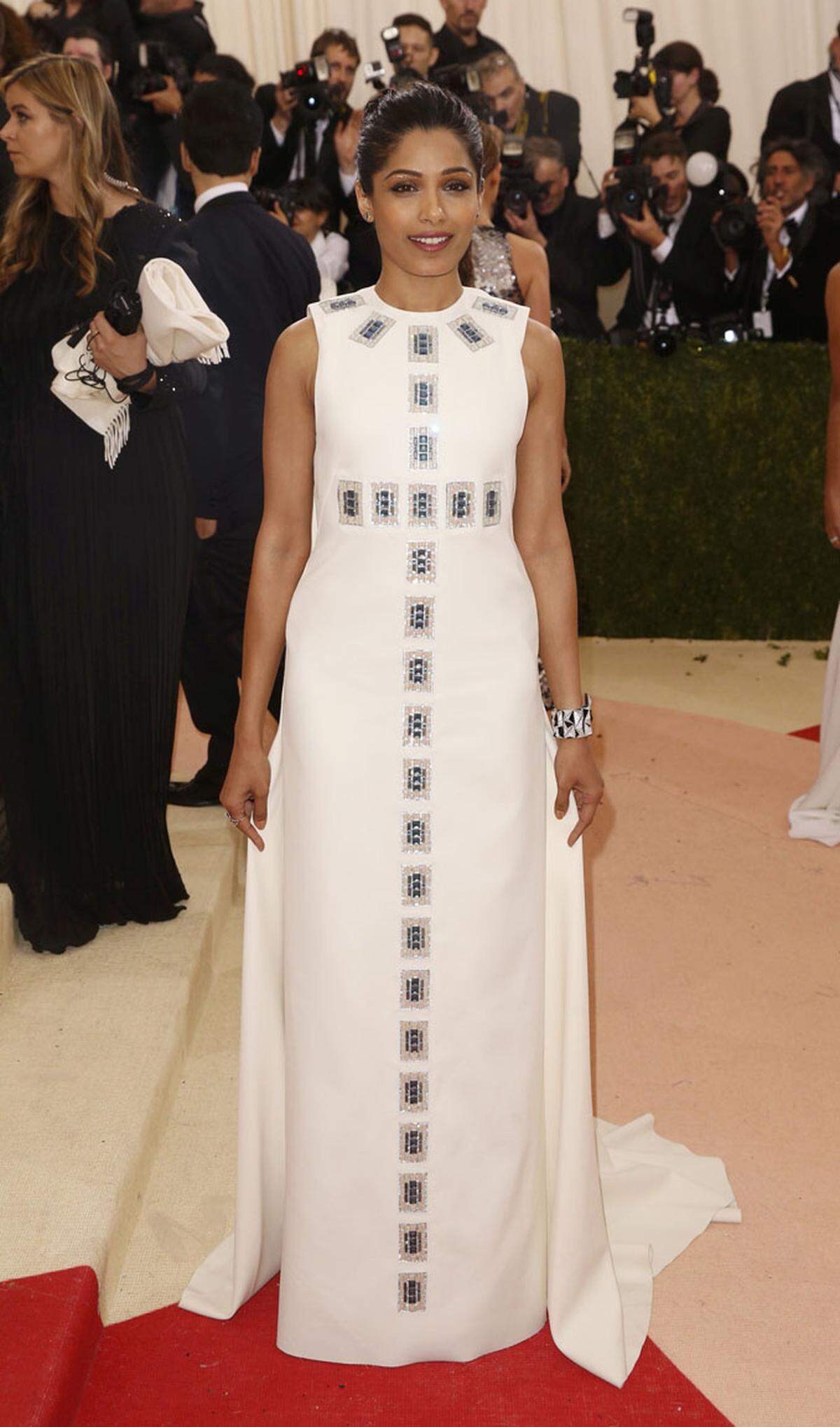 Freida Pinto in Tory Burch.