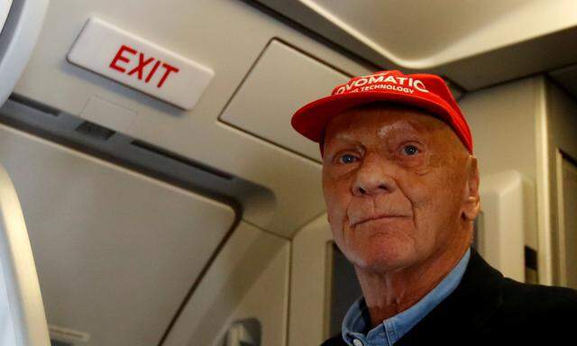 Airline founder Niki Lauda stands aboard a Laudamotion Airbus A320 plane in Duesseldorf