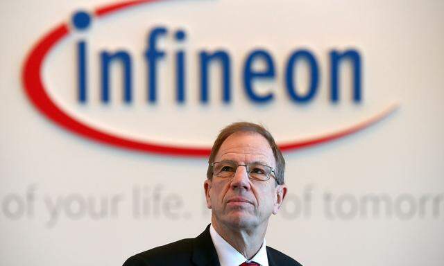 FILE PHOTO: Reinhard Ploss, CEO of German semiconductor manufacturer Infineon poses before the company's annual news conference in Neubiberg