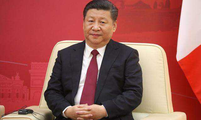 Chinas Präsident Xi Jinping will den Spagat schaffen, sich auf Firmenebene aus dem operativen Geschäft herauszuhalten und zugleich die staatliche Kontrolle über die Betriebe zu behalten
