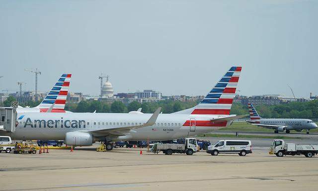 American Airlines Boeing 737 jet sits at a gate at Washington's Reagan National airport