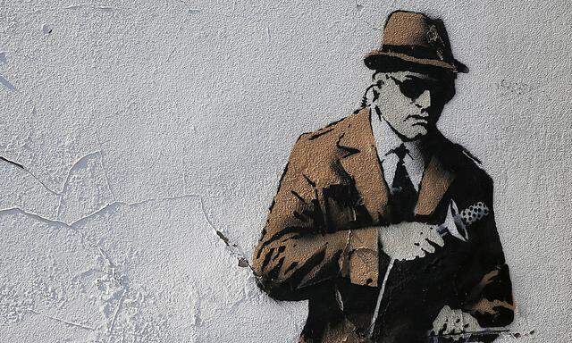 A detail from graffiti art is seen on a wall near the headquarters of Britain´s eavesdropping agency, GCHQ, in Cheltenham, western England