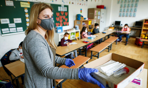Pupils of the Karlschule primary school do ´Lolly´ COVID-19 tests as the school re-opens, in Bonn