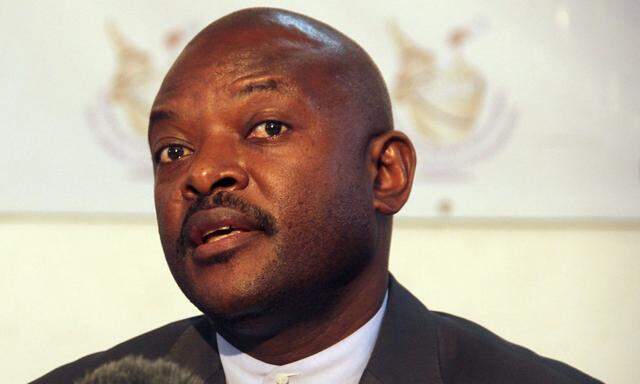 Burundian President Nkurunziza speaks to the media after he registered to run for a third five-year term in office, in the capital Bujumbura