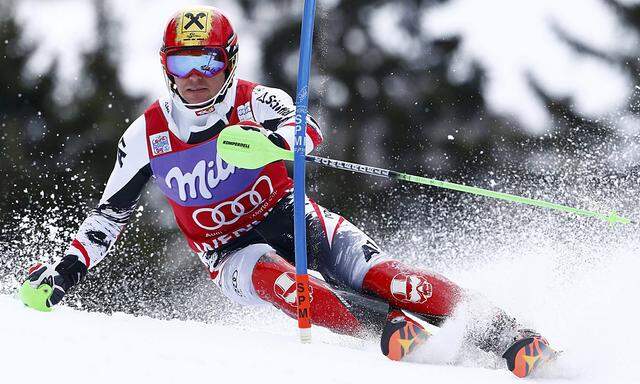 Hirscher of Austria  clears a gate during the first run of the men´s World Cup slalom ski race in Wengen