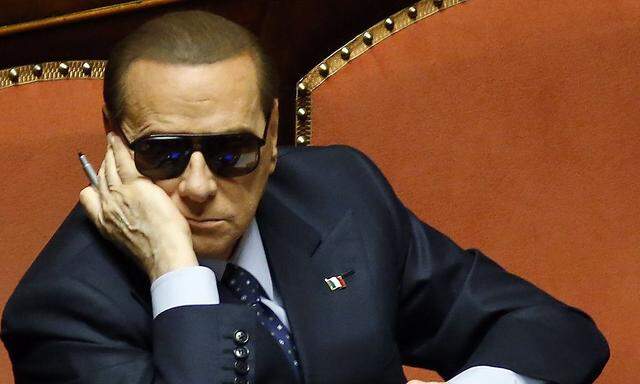 File photo of Italy's former Prime Minister Berlusconi attending a session at the Senate in Rome