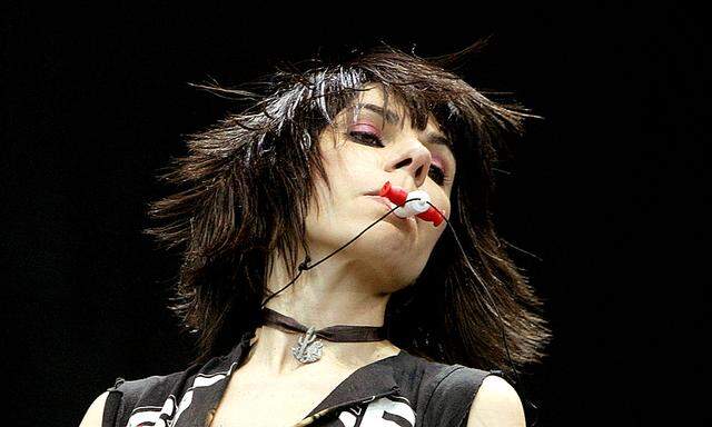 PJ Harvey performs on the first day of the Glastonbury music festival in Somerset, south-west  Engla..