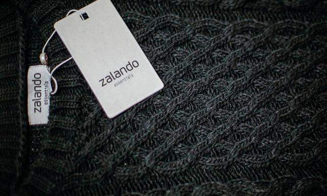 FILE PHOTO: A Zalando label lies on an item of clothing in a showroom of the fashion retailer Zalando in Berlin