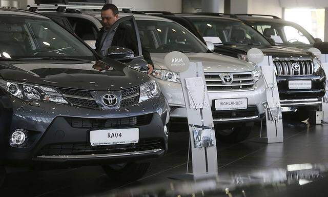 File photo of all-purpose sport-utility vehicles on display at a Toyota car sales and showroom in St. Petersburg