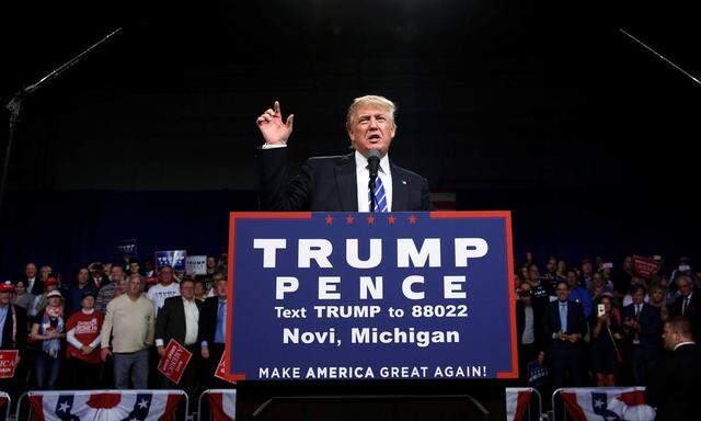 Republican presidential nominee Donald Trump holds a rally with supporters at the Suburban Collection Showplace in Novi, Michigan