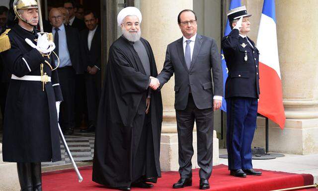 François Hollande rollte den roten Teppich für den iranischen Präsidenten Hassan Rohani aus.