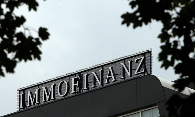 FILE PHOTO: The logo of Austrian real estate group Immofinanz is pictured on top of the company's headquarters building in Vienna