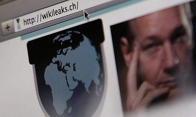 A screen shot of a web browser displaying the WikiLeaks website with a picture of its founder Julian 