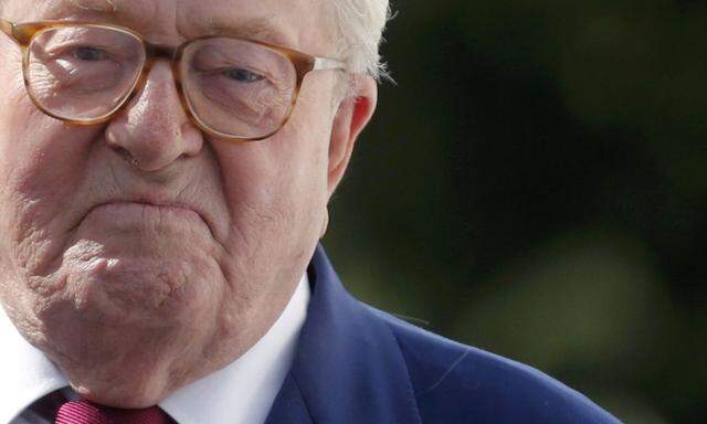 French far-right National Front founder Jean-Marie Le Pen arrives for a news briefing at the end of a hearing of the executive committee of the party at their headquarters in Nanterre